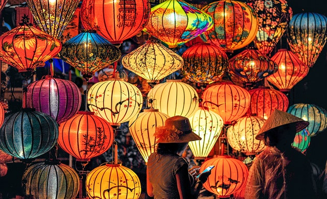two-person-standing-near-assorted-color-paper-lanterns-1313814.jpg